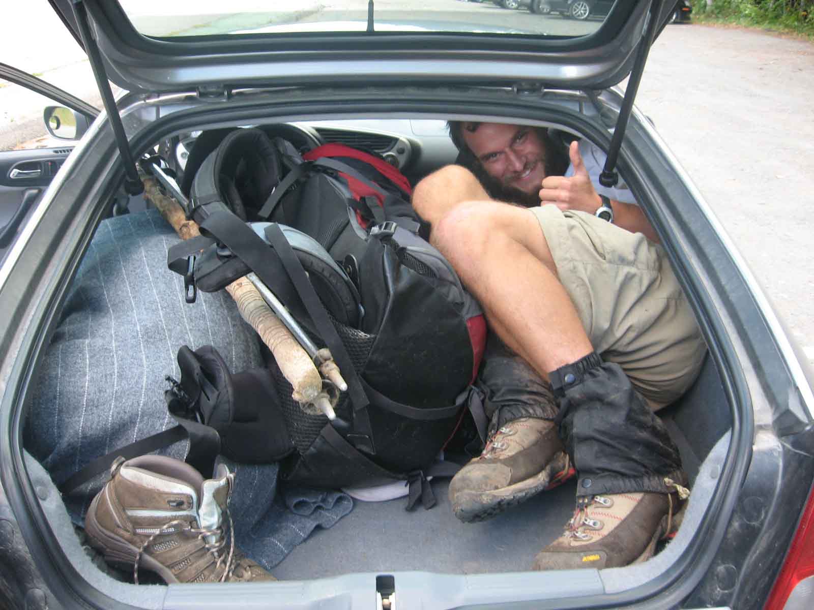 Optimus squeezed in the back of the Honda Insight once again.