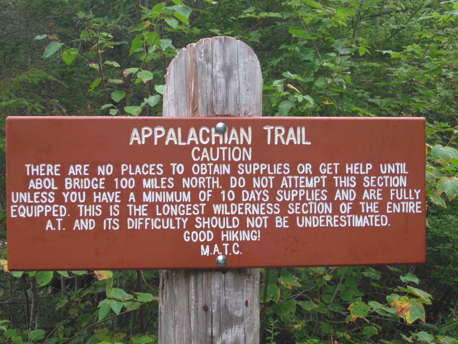 The sign at the start of the 100 mile wilderness.